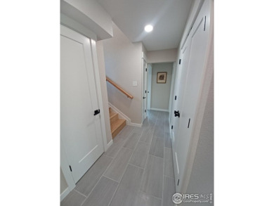 Location, views and updated finishes, this home has it all! on Sunset Golf Course in Colorado - for sale on GolfHomes.com, golf home, golf lot