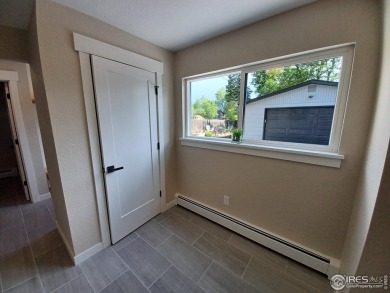 Location, views and updated finishes, this home has it all! on Sunset Golf Course in Colorado - for sale on GolfHomes.com, golf home, golf lot