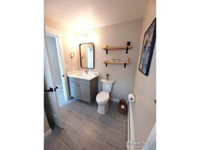Location, views and updated finishes, this home has it all! on Sunset Golf Course in Colorado - for sale on GolfHomes.com, golf home, golf lot