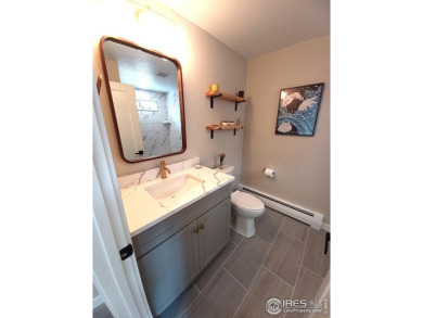 Location, views and updated finishes, this home has it all! on Sunset Golf Course in Colorado - for sale on GolfHomes.com, golf home, golf lot