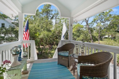 Gorgeous custom built home with enchanting marsh views. Walk to on Ocean Creek Golf Course in South Carolina - for sale on GolfHomes.com, golf home, golf lot