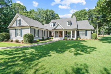 Remodeled home located on the award winning Great Waters Golf on Great Waters Course At Reynolds Plantation in Georgia - for sale on GolfHomes.com, golf home, golf lot