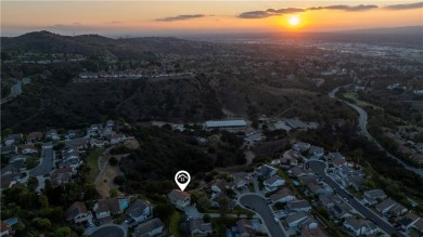 This one is special. Nestled on a peaceful, secluded lot in on Anaheim Hills Golf Course in California - for sale on GolfHomes.com, golf home, golf lot