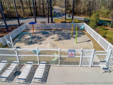 Inside the gates of Anderson Creek Club, this elegant home sits on Anderson Creek Golf Club in North Carolina - for sale on GolfHomes.com, golf home, golf lot