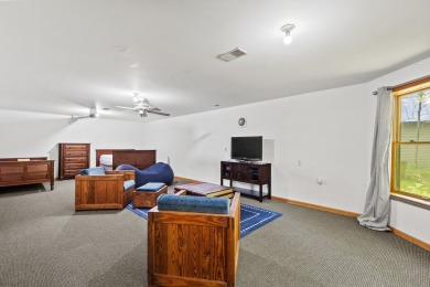This beautiful Lake Mecosta property features 137 feet of nice on St. Ives Golf Club in Michigan - for sale on GolfHomes.com, golf home, golf lot