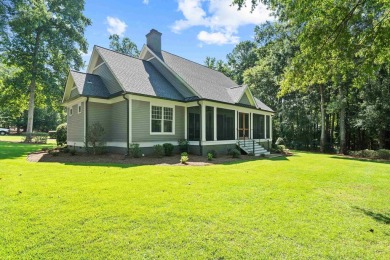 Remodeled home located on the award winning Great Waters Golf on Great Waters Course At Reynolds Plantation in Georgia - for sale on GolfHomes.com, golf home, golf lot