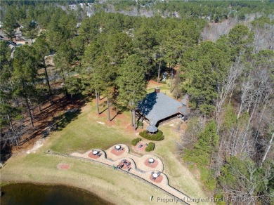 Inside the gates of Anderson Creek Club, this elegant home sits on Anderson Creek Golf Club in North Carolina - for sale on GolfHomes.com, golf home, golf lot