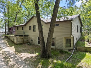 This beautiful Lake Mecosta property features 137 feet of nice on St. Ives Golf Club in Michigan - for sale on GolfHomes.com, golf home, golf lot