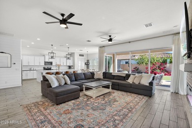 Discover modern comfort in this 4-bedroom, 3-bath Queen Creek on Las Colinas Golf Club in Arizona - for sale on GolfHomes.com, golf home, golf lot