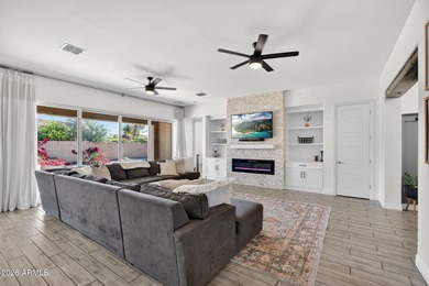 Discover modern comfort in this 4-bedroom, 3-bath Queen Creek on Las Colinas Golf Club in Arizona - for sale on GolfHomes.com, golf home, golf lot