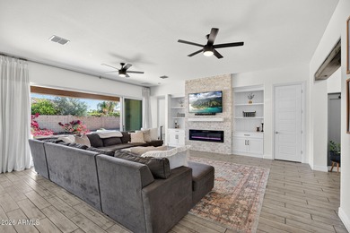 Discover modern comfort in this 4-bedroom, 3-bath Queen Creek on Las Colinas Golf Club in Arizona - for sale on GolfHomes.com, golf home, golf lot