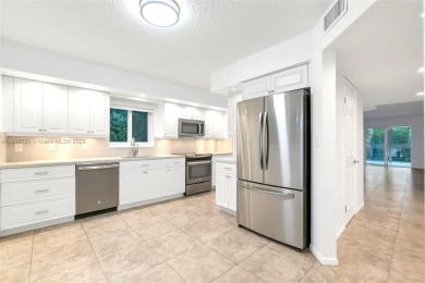 Rarely available CORNER UNIT on the water. Stunning and freshly on Wynmoor Golf Course in Florida - for sale on GolfHomes.com, golf home, golf lot