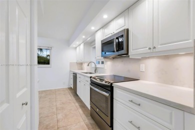 Rarely available CORNER UNIT on the water. Stunning and freshly on Wynmoor Golf Course in Florida - for sale on GolfHomes.com, golf home, golf lot