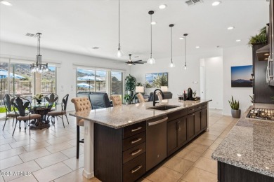 Perched on a premium view lot in Estrella Mountain Ranch, this on Estrella Mountain Ranch Golf Course in Arizona - for sale on GolfHomes.com, golf home, golf lot