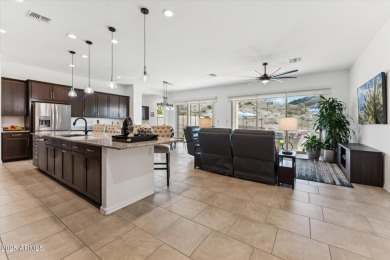 Perched on a premium view lot in Estrella Mountain Ranch, this on Estrella Mountain Ranch Golf Course in Arizona - for sale on GolfHomes.com, golf home, golf lot