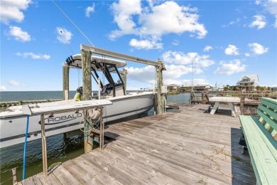 Charming Waterfront Oasis with Breathtaking Sunrises  Sunsets on Isle Dauphine Club Golf Course in Alabama - for sale on GolfHomes.com, golf home, golf lot