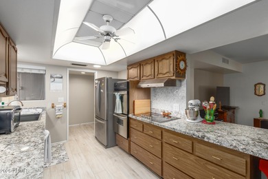 Enjoy this well-maintained Gemini Twin duplex across from on PalmBrook Country Club in Arizona - for sale on GolfHomes.com, golf home, golf lot