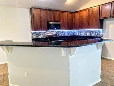 Coastal Cottage Charm: Well-Maintained 2-Bed, 2-Bath with Bonus on Rockport Country Club in Texas - for sale on GolfHomes.com, golf home, golf lot