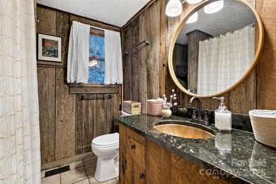 HUGE PRICE IMPROVEMENT - Happy Holidays from Serenity Lodge! on Wolf Laurel Country Club in North Carolina - for sale on GolfHomes.com, golf home, golf lot