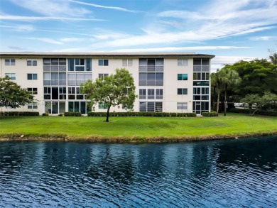 Rarely available CORNER UNIT on the water. Stunning and freshly on Wynmoor Golf Course in Florida - for sale on GolfHomes.com, golf home, golf lot