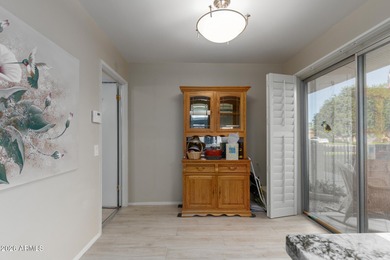 Enjoy this well-maintained Gemini Twin duplex across from on PalmBrook Country Club in Arizona - for sale on GolfHomes.com, golf home, golf lot