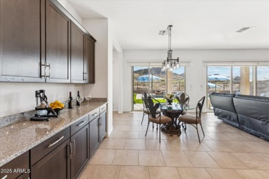 Perched on a premium view lot in Estrella Mountain Ranch, this on Estrella Mountain Ranch Golf Course in Arizona - for sale on GolfHomes.com, golf home, golf lot