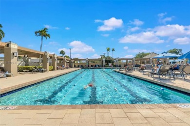 Rarely available CORNER UNIT on the water. Stunning and freshly on Wynmoor Golf Course in Florida - for sale on GolfHomes.com, golf home, golf lot