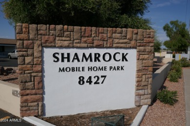 Move-in ready and spacious, this multi-wide home in Shamrock on Desert Mirage Golf Course in Arizona - for sale on GolfHomes.com, golf home, golf lot