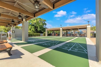 Rarely available CORNER UNIT on the water. Stunning and freshly on Wynmoor Golf Course in Florida - for sale on GolfHomes.com, golf home, golf lot