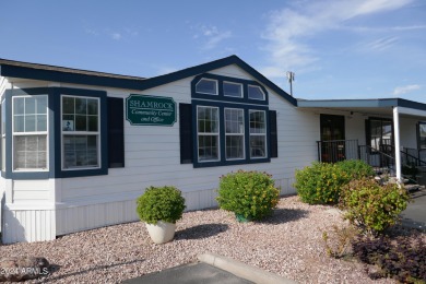 Move-in ready and spacious, this multi-wide home in Shamrock on Desert Mirage Golf Course in Arizona - for sale on GolfHomes.com, golf home, golf lot