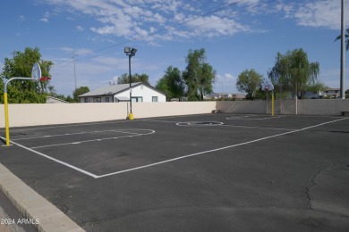 Move-in ready and spacious, this multi-wide home in Shamrock on Desert Mirage Golf Course in Arizona - for sale on GolfHomes.com, golf home, golf lot