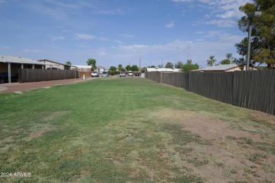 Move-in ready and spacious, this multi-wide home in Shamrock on Desert Mirage Golf Course in Arizona - for sale on GolfHomes.com, golf home, golf lot