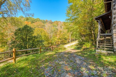 HUGE PRICE IMPROVEMENT - Happy Holidays from Serenity Lodge! on Wolf Laurel Country Club in North Carolina - for sale on GolfHomes.com, golf home, golf lot