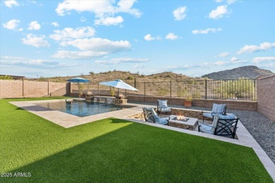 Perched on a premium view lot in Estrella Mountain Ranch, this on Estrella Mountain Ranch Golf Course in Arizona - for sale on GolfHomes.com, golf home, golf lot