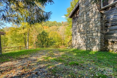 HUGE PRICE IMPROVEMENT - Happy Holidays from Serenity Lodge! on Wolf Laurel Country Club in North Carolina - for sale on GolfHomes.com, golf home, golf lot