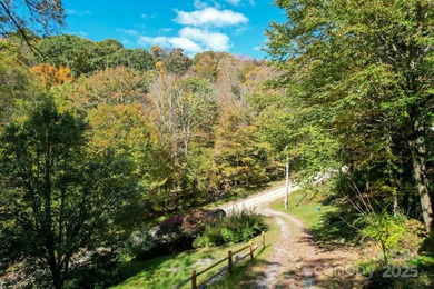 HUGE PRICE IMPROVEMENT - Happy Holidays from Serenity Lodge! on Wolf Laurel Country Club in North Carolina - for sale on GolfHomes.com, golf home, golf lot