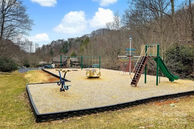 HUGE PRICE IMPROVEMENT - Happy Holidays from Serenity Lodge! on Wolf Laurel Country Club in North Carolina - for sale on GolfHomes.com, golf home, golf lot