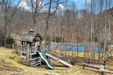 HUGE PRICE IMPROVEMENT - Happy Holidays from Serenity Lodge! on Wolf Laurel Country Club in North Carolina - for sale on GolfHomes.com, golf home, golf lot