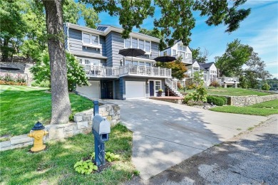 Wake up each day to the peaceful beauty of Lake Quivira in this on Lake Quivira Country Club in Kansas - for sale on GolfHomes.com, golf home, golf lot