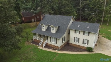 Priced to Sell: Charming house needing your finishing touch! on Twin Lakes Golf Course in Alabama - for sale on GolfHomes.com, golf home, golf lot