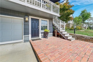 Wake up each day to the peaceful beauty of Lake Quivira in this on Lake Quivira Country Club in Kansas - for sale on GolfHomes.com, golf home, golf lot