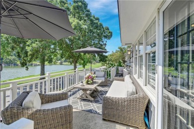 Wake up each day to the peaceful beauty of Lake Quivira in this on Lake Quivira Country Club in Kansas - for sale on GolfHomes.com, golf home, golf lot