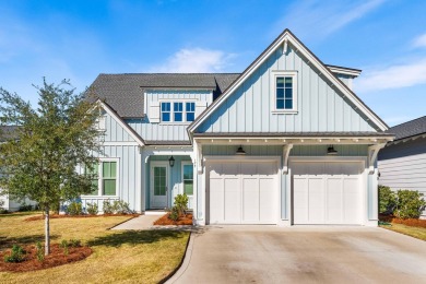 Nestled in a serene setting, this stunning 5-bedroom, 4 on Origins Golf Club in Florida - for sale on GolfHomes.com, golf home, golf lot