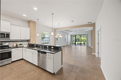 Welcome to maintenance-free living in the sought-after gated on Lakewood Ranch Golf and Country Club in Florida - for sale on GolfHomes.com, golf home, golf lot
