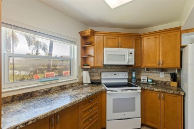 Welcome to Mirada, a rarely available, turn-key move in ready on Isla Del Sol Yacht and Country Club in Florida - for sale on GolfHomes.com, golf home, golf lot