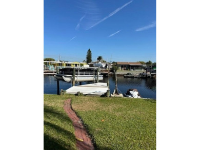 Opportunity for cash buyer! House flooded in Helene, everything on Gulf Harbors Golf Course in Florida - for sale on GolfHomes.com, golf home, golf lot