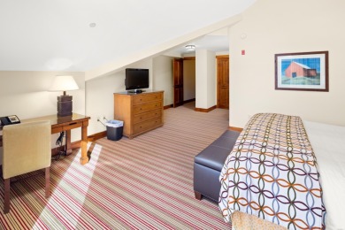 Discover The Lodge at Spruce Peak, the crown jewel of the Alpine on Stowe Mountain Club in Vermont - for sale on GolfHomes.com, golf home, golf lot