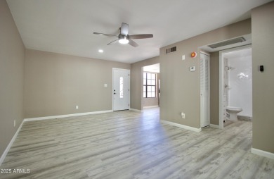 Beautiful Completely remodeled inside of this one level patio on Fountain of the Sun Country Club in Arizona - for sale on GolfHomes.com, golf home, golf lot