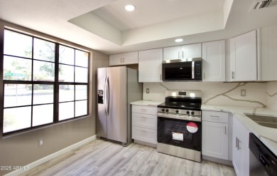 Beautiful Completely remodeled inside of this one level patio on Fountain of the Sun Country Club in Arizona - for sale on GolfHomes.com, golf home, golf lot