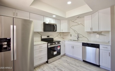 Beautiful Completely remodeled inside of this one level patio on Fountain of the Sun Country Club in Arizona - for sale on GolfHomes.com, golf home, golf lot